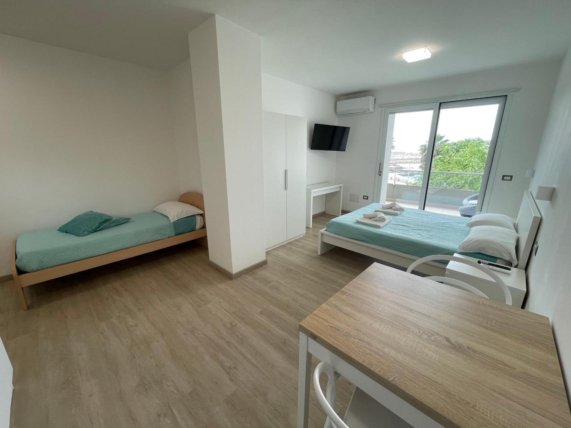 Casa Vacanza Acquamarina Porto Torres Bagian luar foto