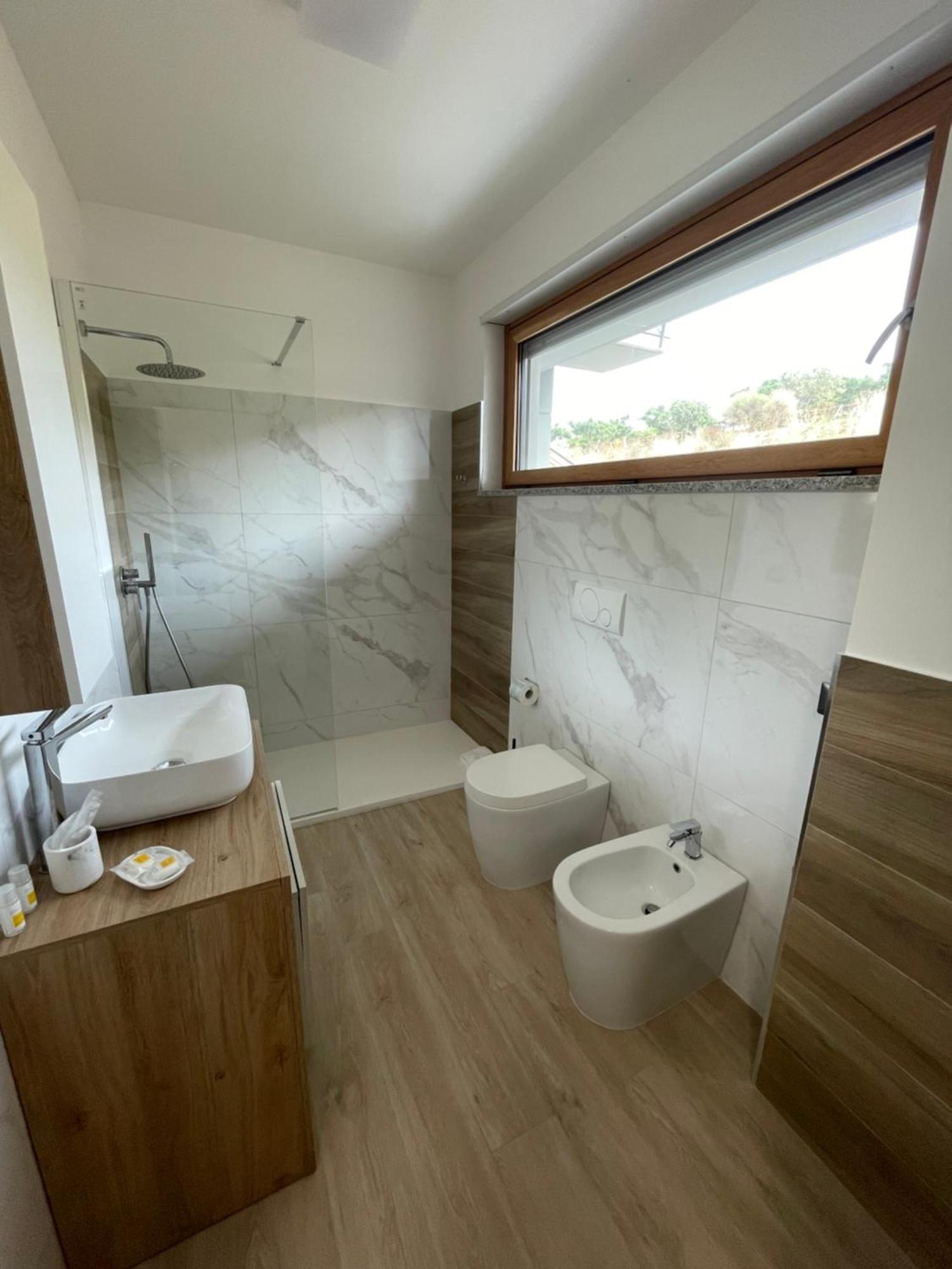Casa Vacanza Acquamarina Porto Torres Bagian luar foto